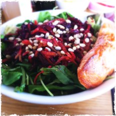 Big fresh salad with pan-fried salmon