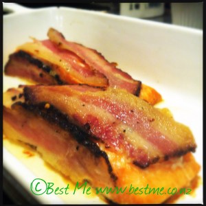 Salmon wrapped in Prodigal Pig Proscuitto, baked and served with steamed asparagus and fermetned veggies - sooo good!